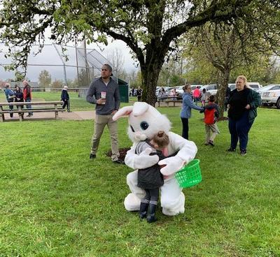 child hugs bunny